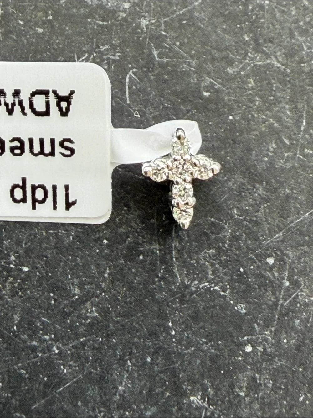 14kt white gold diamond cross .06 carats